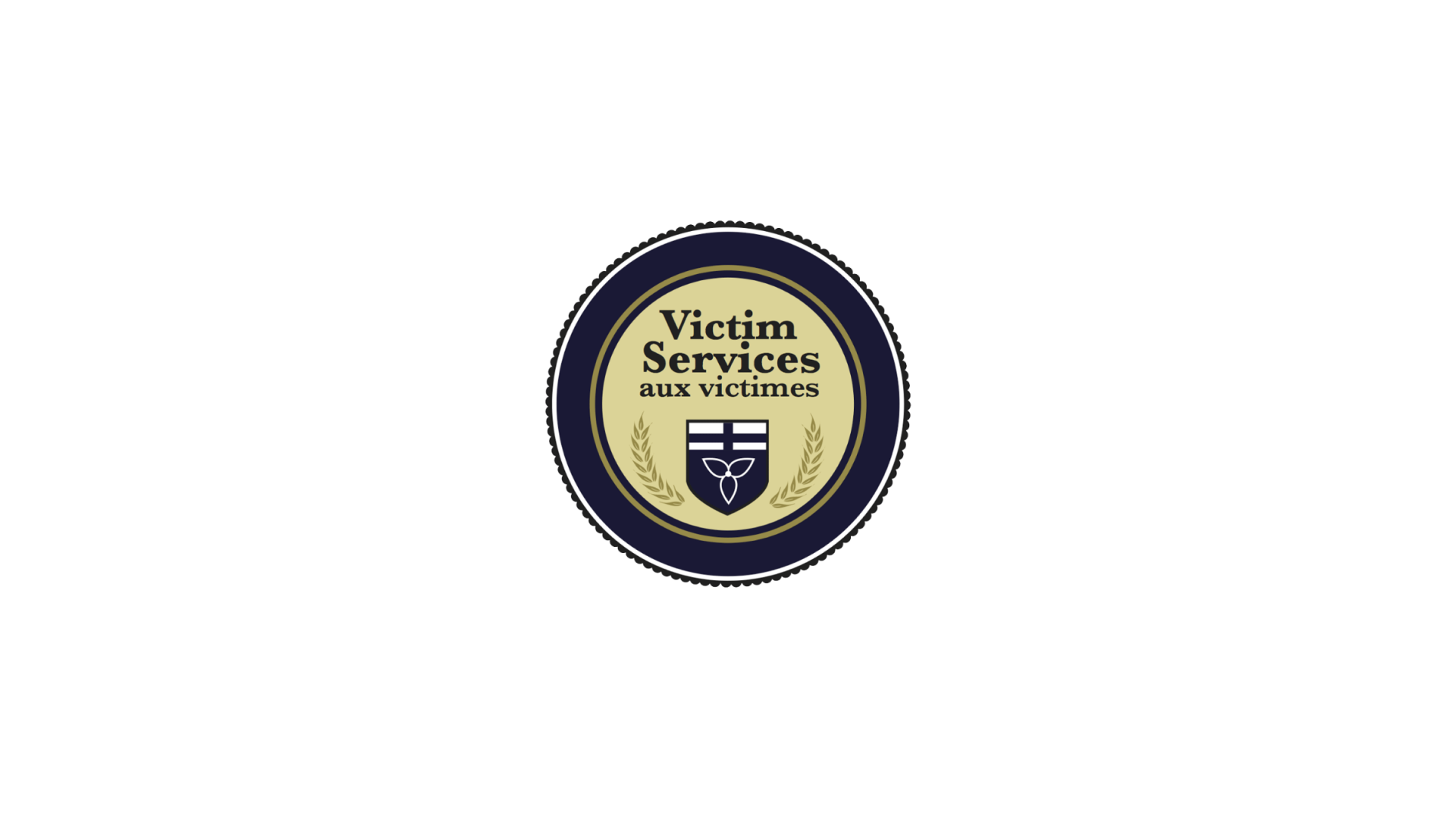 Timmins Care Logo of Victim Services with a blue, circular border, a shield in the center, and text reading "Victim Services aux victimes. Cochrane District Social Services Administration Board